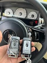 BMW Car Key Programming Dubai | Car Locksmith Dubai BMW car key programming Dubai โ BMW comfort access smart keys on dashboard, ready after programming