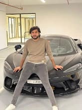 Car Key Service Dubai โ Certified Automotive Locksmith Technician Car locksmith Dubai expert technician โ professional automotive locksmith with luxury supercar in Dubai