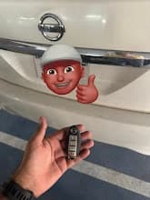 Car Key Replacement Dubai — Car Locksmith Dubai Car key replacement Dubai — completed Nissan car key replacement service with new smart key